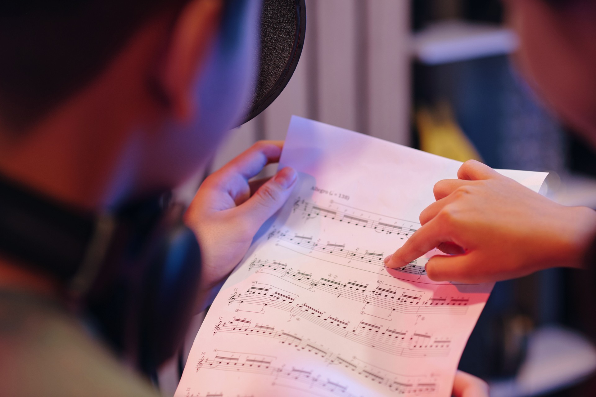 Reviewing Sheet Music in Professional Recording Studio